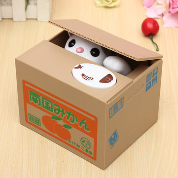 Gadżety w domu podróżnika, prezent dla podróznika - japońska skarbonka kotek wciągający pieniążek